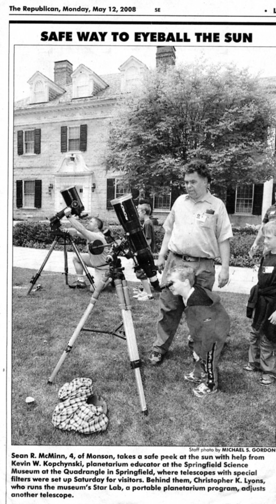 Kevin with his telescope and museum patrons